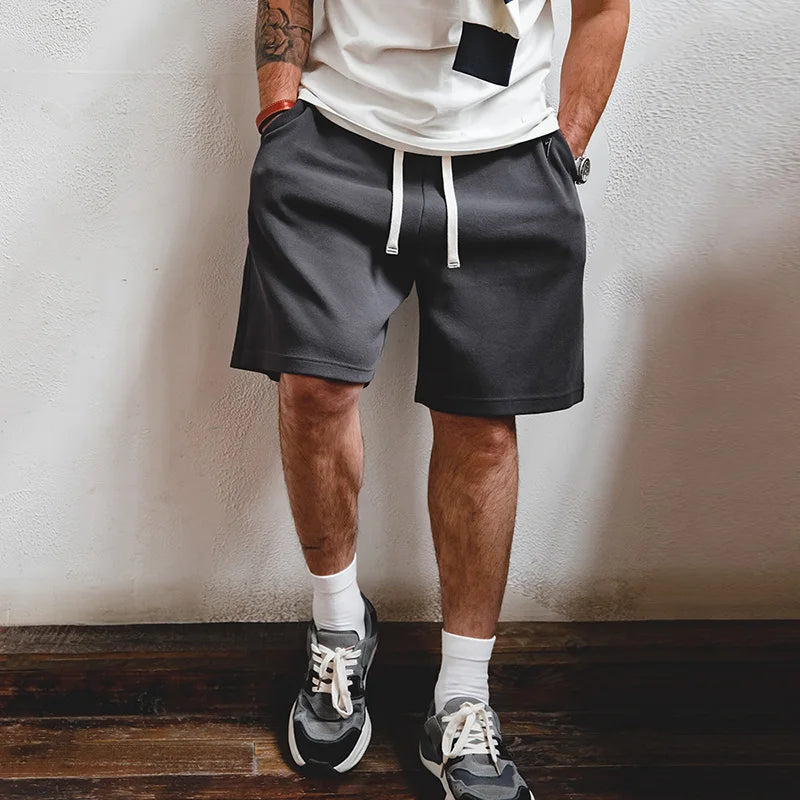 Herren Freizeitshorts aus atmungsaktivem Material mit gesticktem Blitzdesign