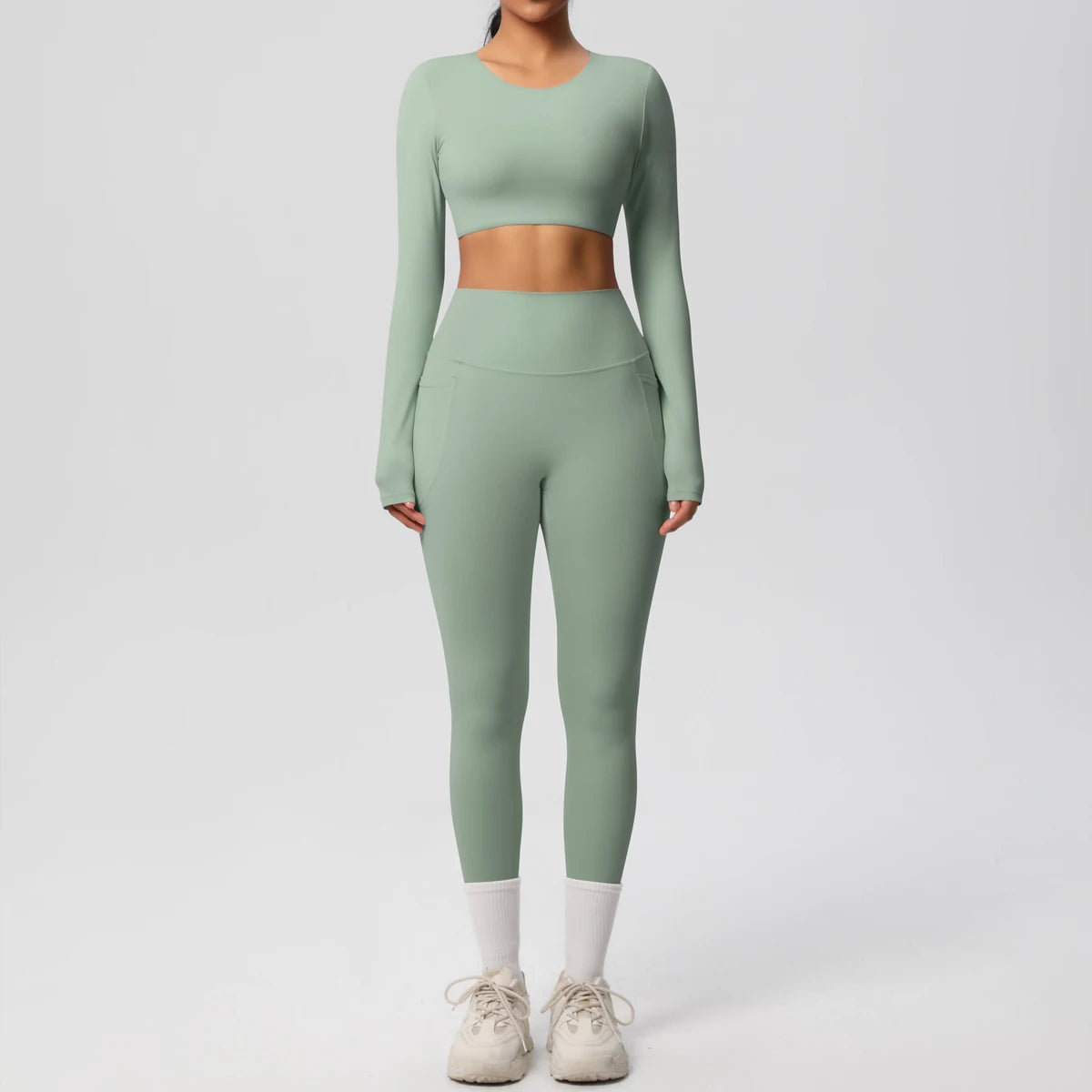 Hellgrünes Yoga-Set mit langen Ärmeln und hoch geschnittener Leggings