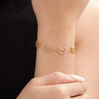 Damen-Charm-Armband mit Herzschleife und Zirkonia