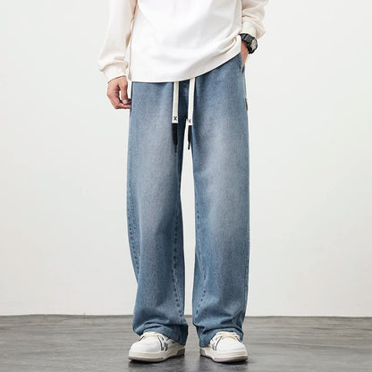 Männer Jeans mit elastischer Taille in schwarz-blauer Farbgebung im Hip Hop Stil
