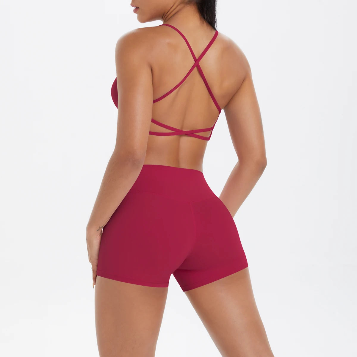 Damen-Yoga-Set: Crop-Top mit gekreuzten Rückenträgern und Shorts, fuchsia/rot