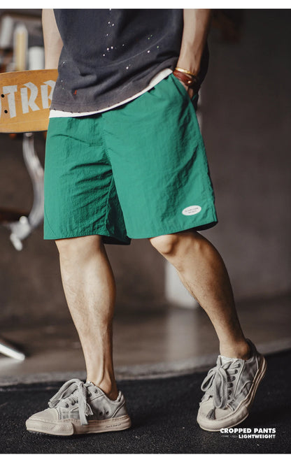 Herren Shorts im sportlichen Funktionsstil mit elastischer Taille und Taschen