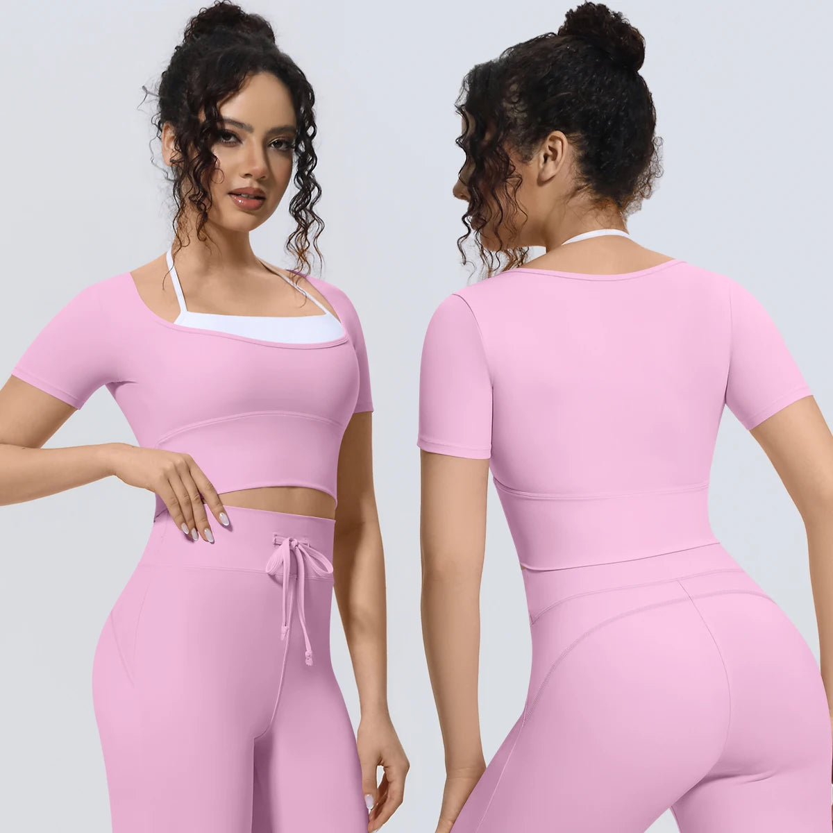 Damen Sportshirt, kurzer Schnitt, rosafarben mit weißem Saum und Trägern