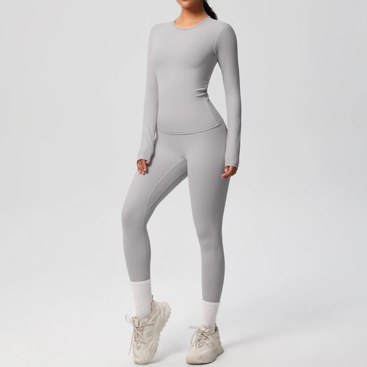 Gym-Leggings-Set mit langarmigem Sport-Top und schmalen Leggings in Hellgrau