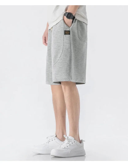 Leichte Herren-Strickjacke mit Waffelstruktur, Taschen und Reverskragen – ideal für Frühling und Herbst.