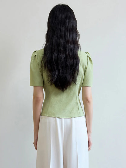 Langarm-Bluse mit V-Ausschnitt und Jacquard-Stoff im chinesischen Stil – einreihig geknöpft in zwei Farben.