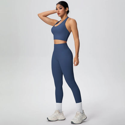 Dunkelblaues Yoga-Set aus Trägertop mit kurzem Schnitt und hochbundiger Leggings