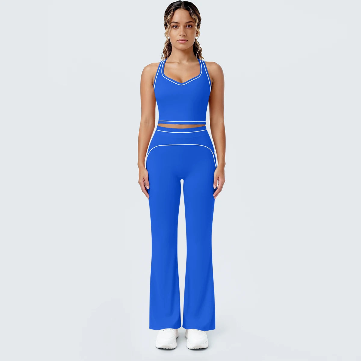Damen-Yoga-Set in Blau: frontale Ansicht von Tank-Top und weitem Bein der Hose mit Linien.
