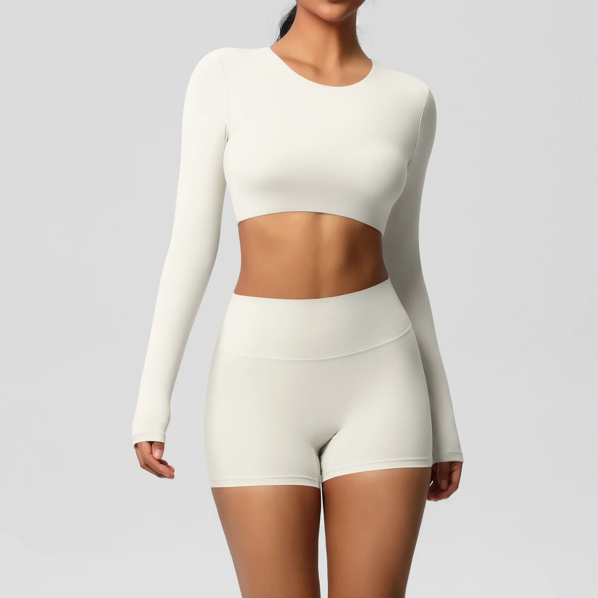 Sport-Set Hellivory: langarm Croptop und kurze Funktions-Shorts