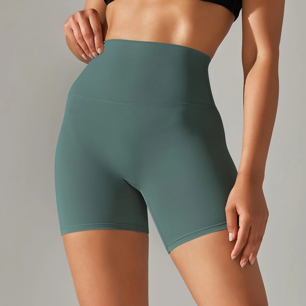 Nahtlose Sportshorts für Frauen mit hohem Bund, petrolgrün, glatte Nahtoptik