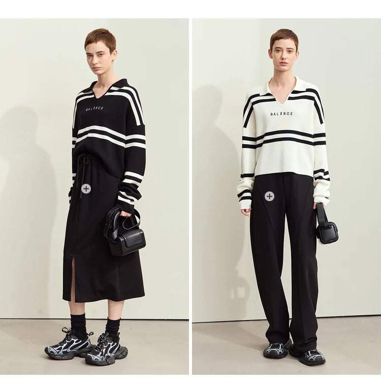 Gestreifter Pullover in Schwarz/Weiß mit V-Ausschnitt und Schriftzug „BALANCE“