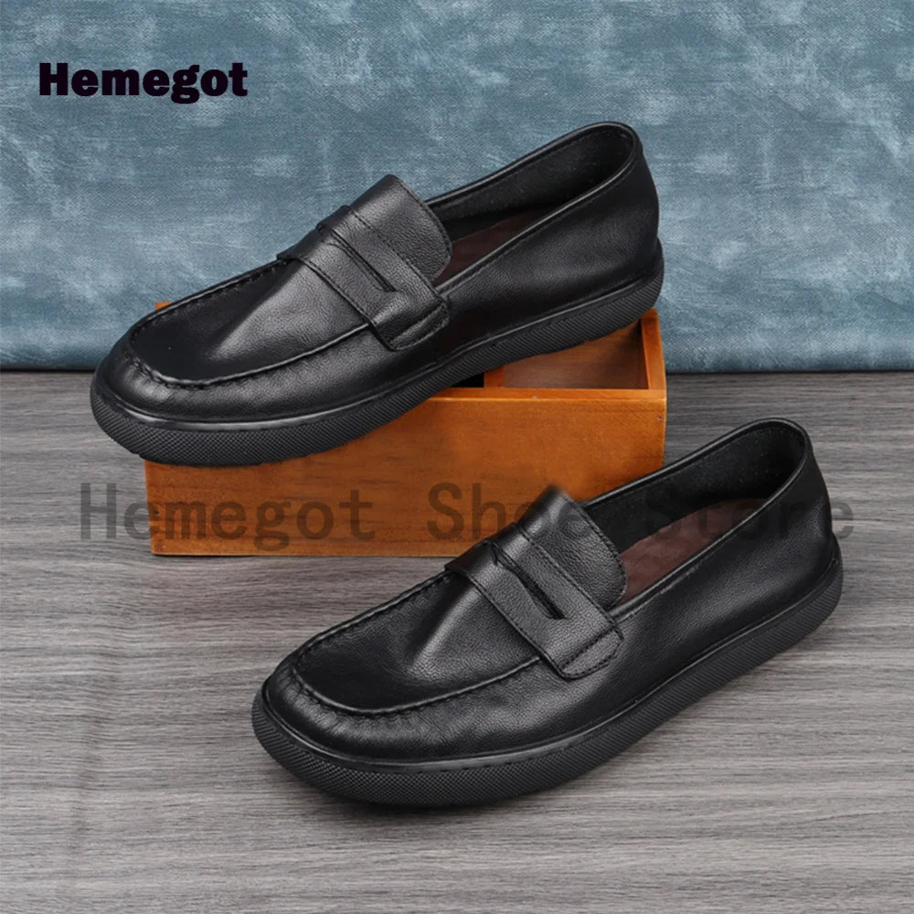 Schwarze Ledermokassins, Slip-On mit Riemen am Spann, Paaransicht