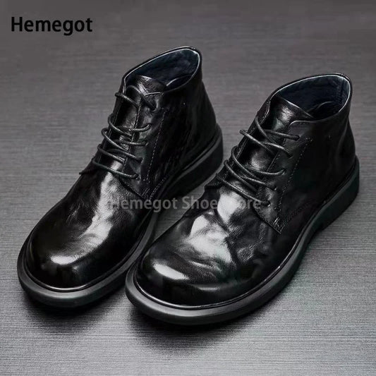 Paar schwarze Herren-Boots mit Schnürsenkeln und gepolstertem Knöchel