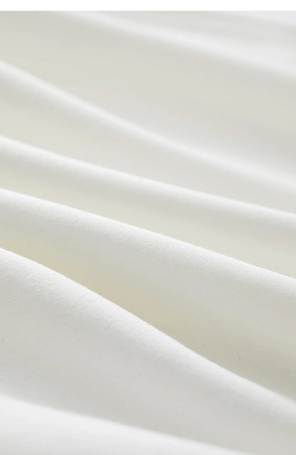 Damen T-Shirts im minimalistischen Stil mit Stickerei und O-Ausschnitt