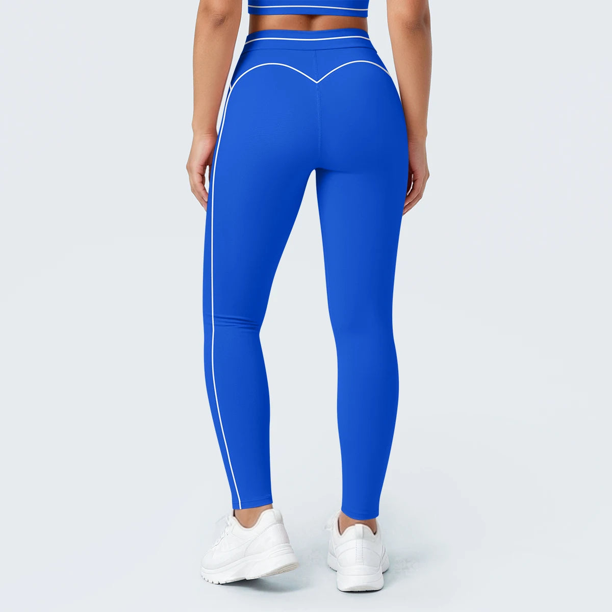 Nahtlose Yoga-Leggings mit hoher Taille, blau, formgebender Naht am Gesäß und Kontrastlinien.
