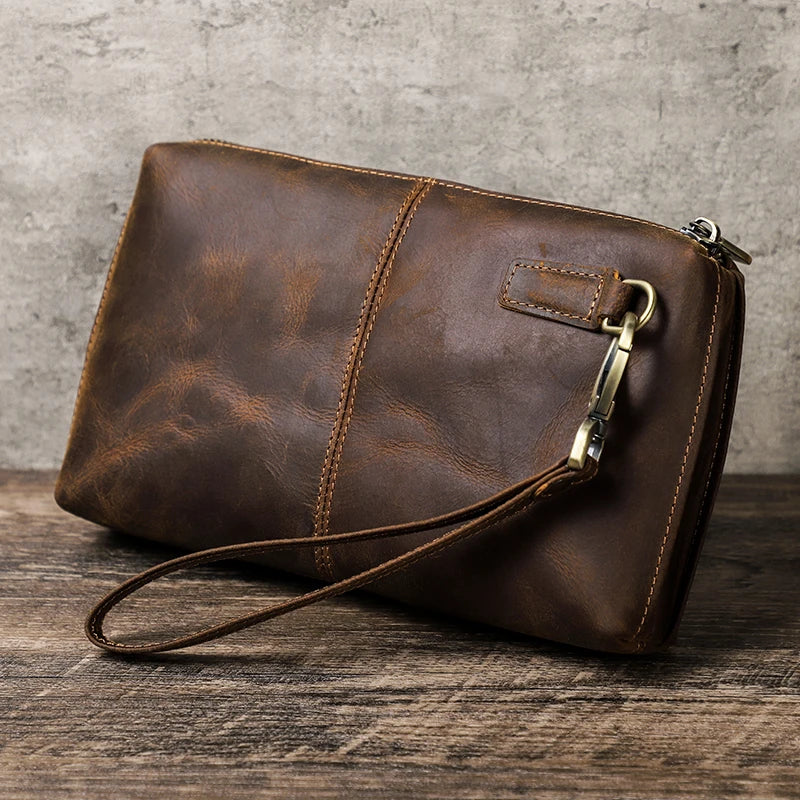 Braune Herren-Clutch aus Leder mit Metallbügel, Reißverschluss und Schulterriemen