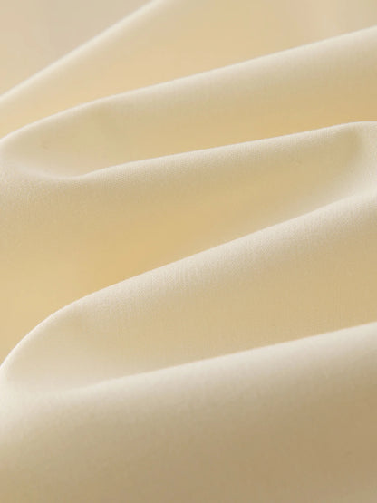 Sommerliche Damenbluse in Übergröße mit taillierter Silhouette und atmungsaktivem Strukturgewebe – ideal für den Alltag