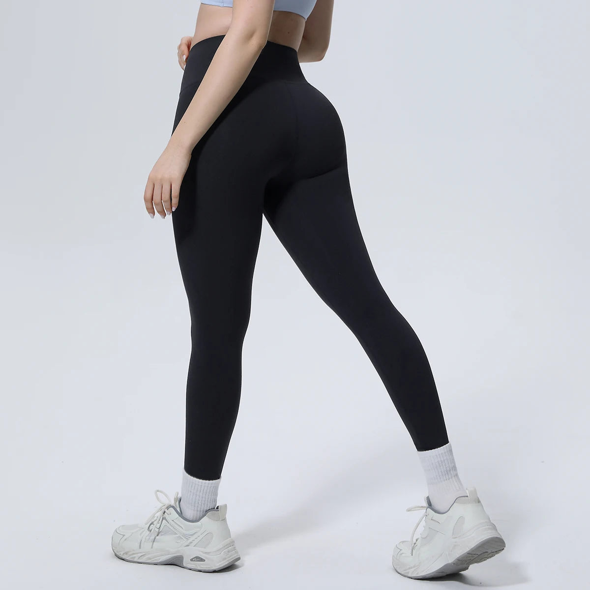 Schwarze Yoga-Leggings, eng anliegend, hoher Bund bis zum Knöchel