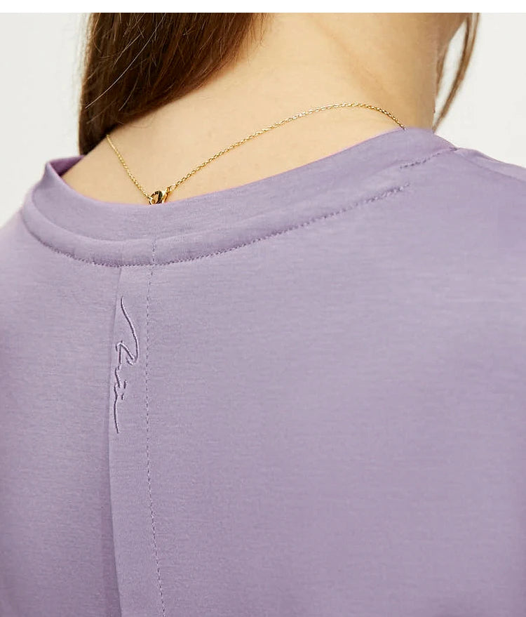 Damen Tops im Minimalismus-Stil mit V-Ausschnitt und kurzen Ärmeln