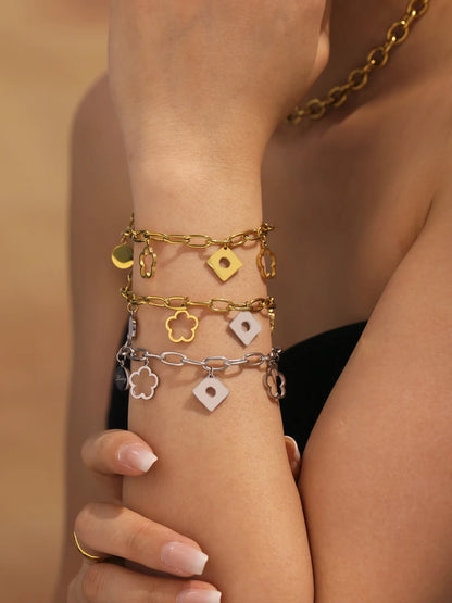 Damen-Charm-Armband mit Blumenmotiv aus Edelstahl