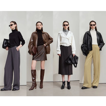 Gestrickter Damenpullover mit langen Ärmeln in Schwarz, Braun und Weiß (Trageansicht).