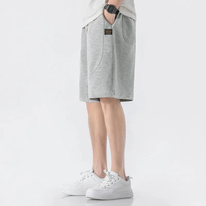 Leichte Herren-Strickjacke mit Waffelstruktur, Taschen und Reverskragen – ideal für Frühling und Herbst.
