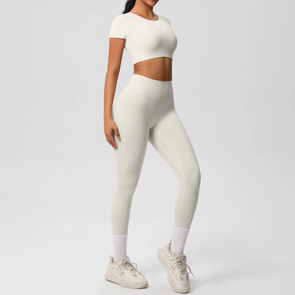 Yoga-Set für Damen: Crop-Top und High-Waist-Leggings, helles Ivory, seitlich.