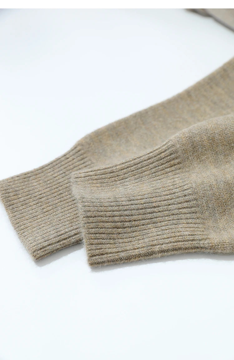 Beiger Damenpullover mit geripptem Ärmelbündchen und feiner Strickstruktur