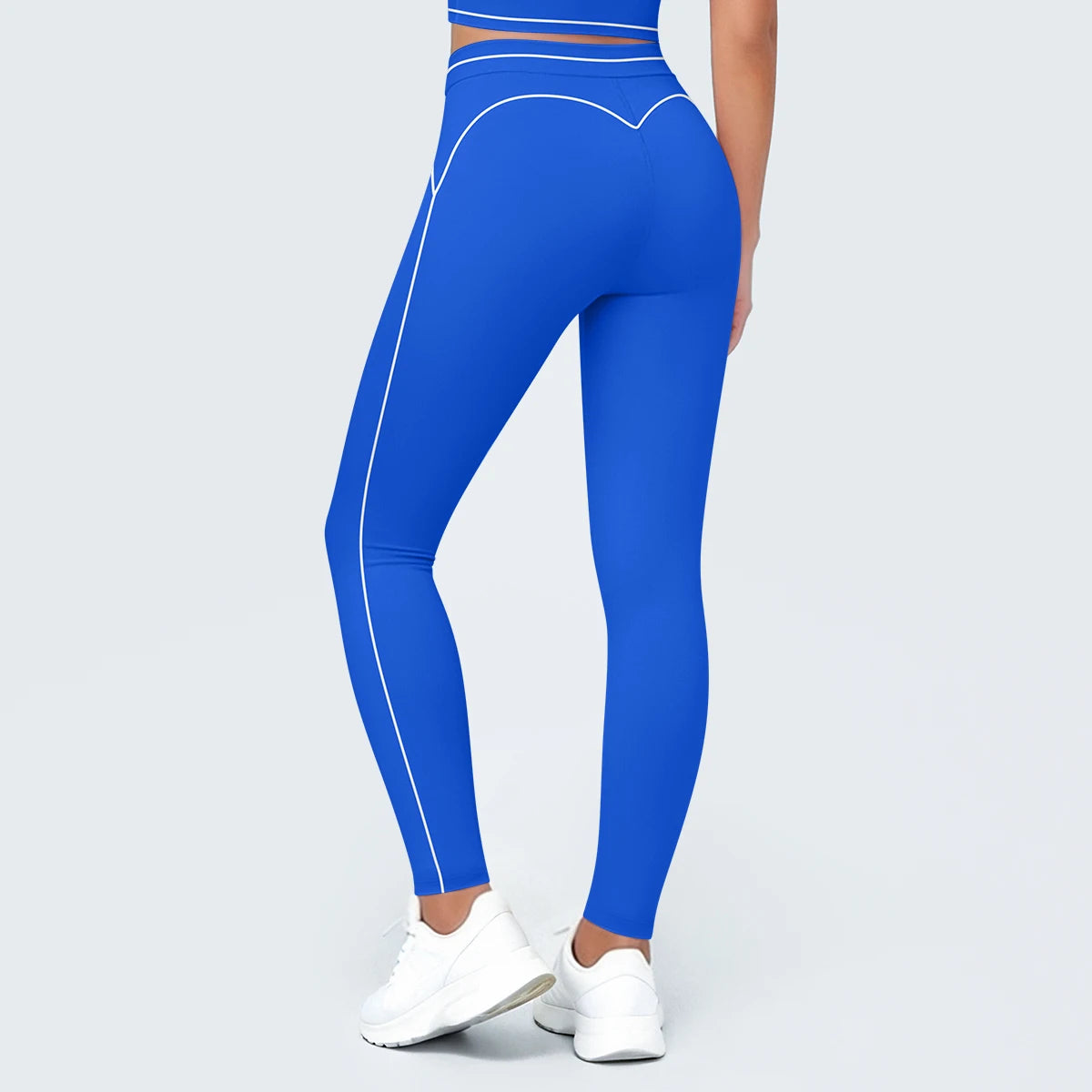 Nahtlose Yoga-Leggings mit hoher Taille, blau, seitlich verläuft ein Kontraststreifen im Verlauf.