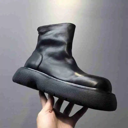 Schwarze Chelsea-Stiefeletten mit dicker Profilsohle und kurzen Schaft