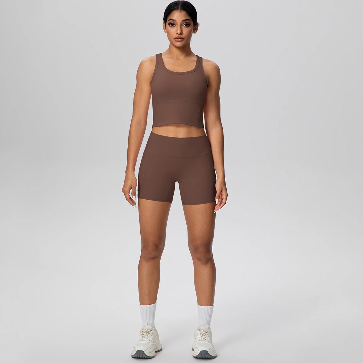 Damen Fitness-Set aus Weste und Laufshorts, braun, Vorderansicht