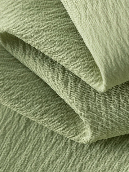 Langarm-Bluse mit V-Ausschnitt und Jacquard-Stoff im chinesischen Stil – einreihig geknöpft in zwei Farben.