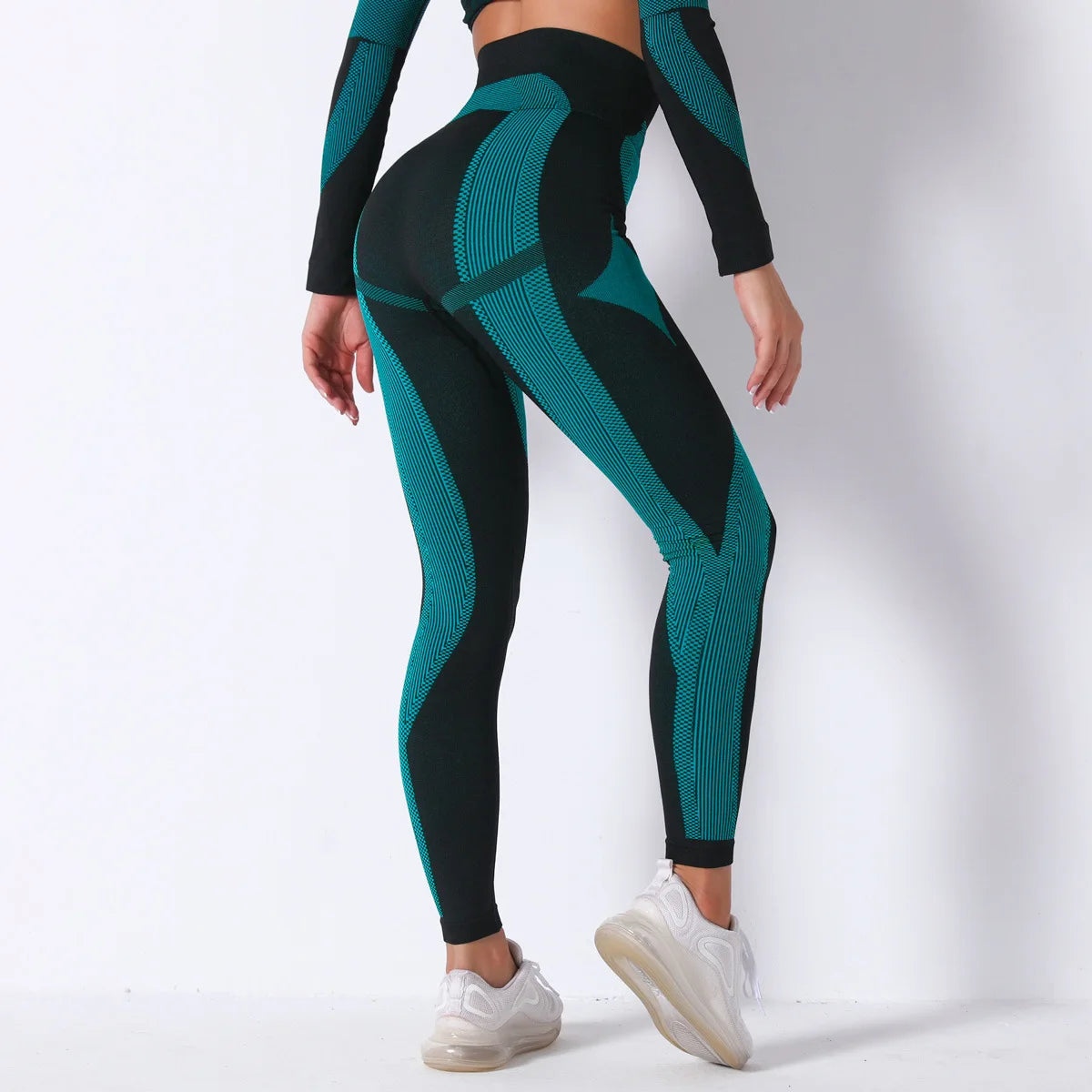 Hamidou nahtlose Yoga-Leggings, schwarz mit petrolblauen Musterstreifen