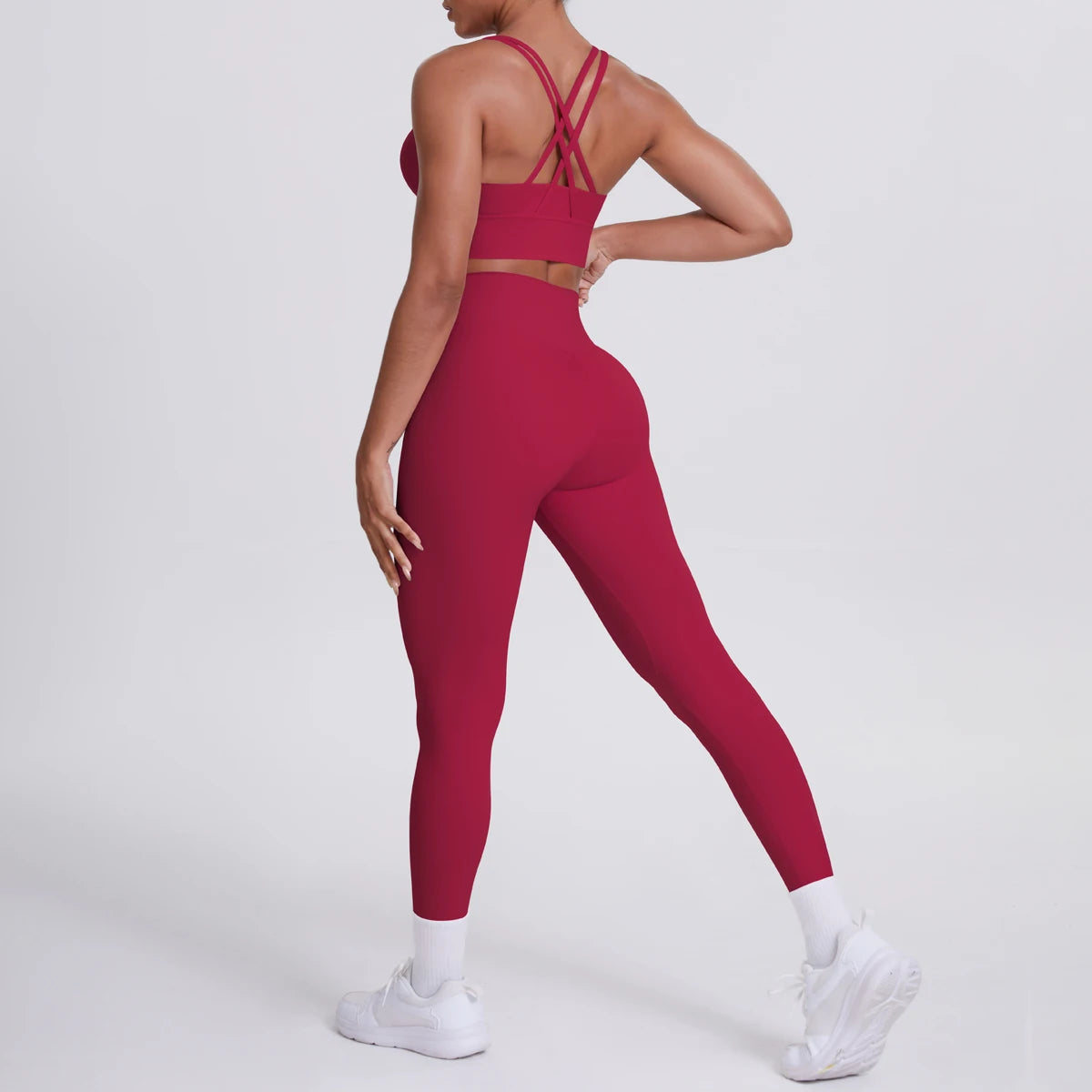 Fitness-Set Rot: Sport-BH mit gekreuzten Rückenträgern, High-Waist-Leggings