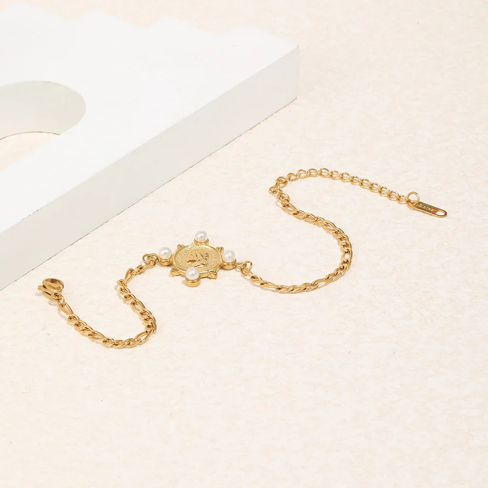 Damen-Armband mit Figaro-Kette und Porträtmünze