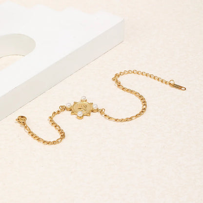 Damen-Armband mit Figaro-Kette und Porträtmünze