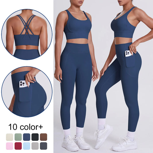 Damen-Yoga-Set aus dunkelblauem Sporttop mit Kreuzriemen und 3/4 Leggings