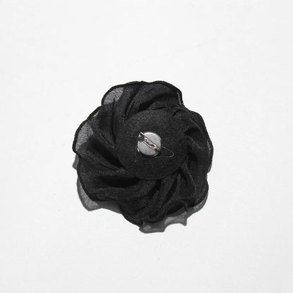 Zweiteiliges Damen-Set mit schulterfreiem Oberteil, langen Ärmeln und Schleifendetail sowie Patchwork-Rock mit Rüschen – elegant und modern.