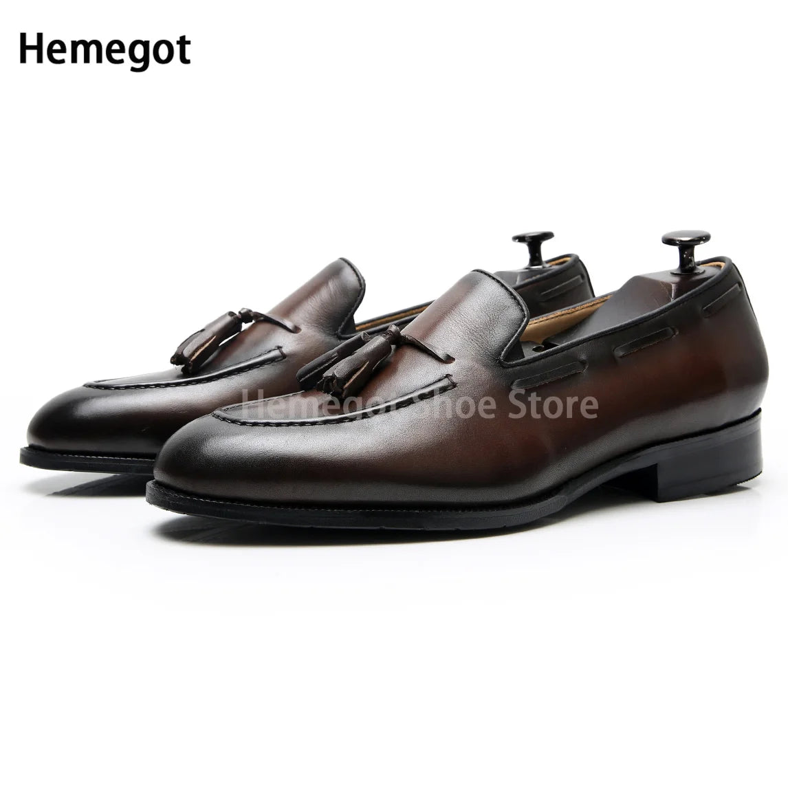 Herren-Loafer aus dunklem Leder mit Quasten-Details, Slip-on, flache Sohle