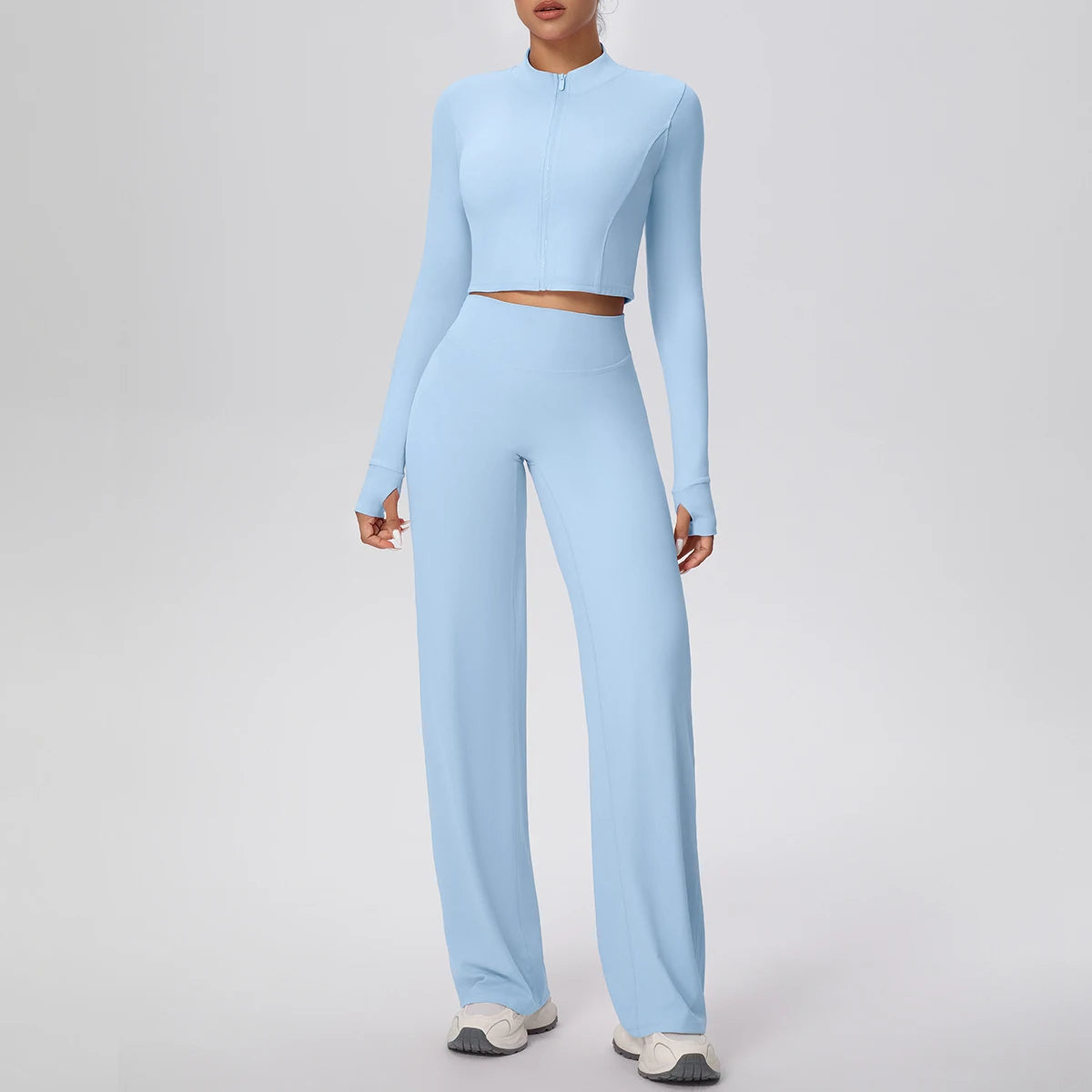 Hellblaues Yoga-Set für Damen: Zip-Crop-Top und lange, hochbundige Hose