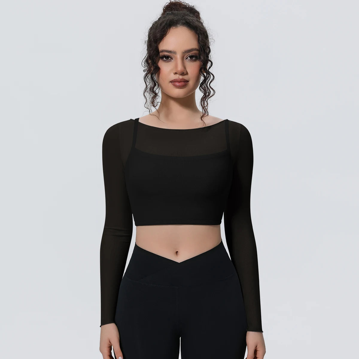 Damen Langarm-Yoga-Shirt schwarz, enges Crop mit transparenten Bahnen am Oberteil
