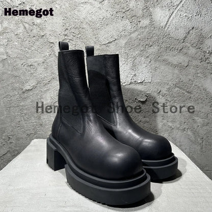 Schwarze Chelsea-Boots aus Leder mit dicker Profilsohle und Blockabsatz