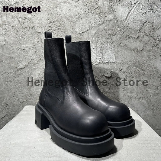 Schwarze Chelsea-Boots aus Leder mit dicker Profilsohle und Blockabsatz