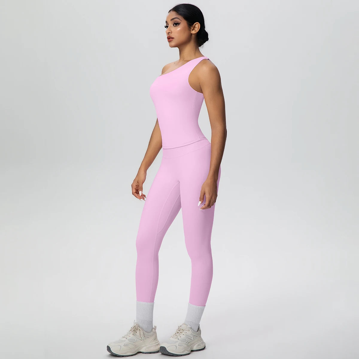 Rosa Yoga-Sportset mit Crop-Top und Leggings, Rückansicht mit Beinabschlüssen