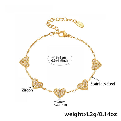 Damen-Charm-Armband mit Herzschleife und Zirkonia