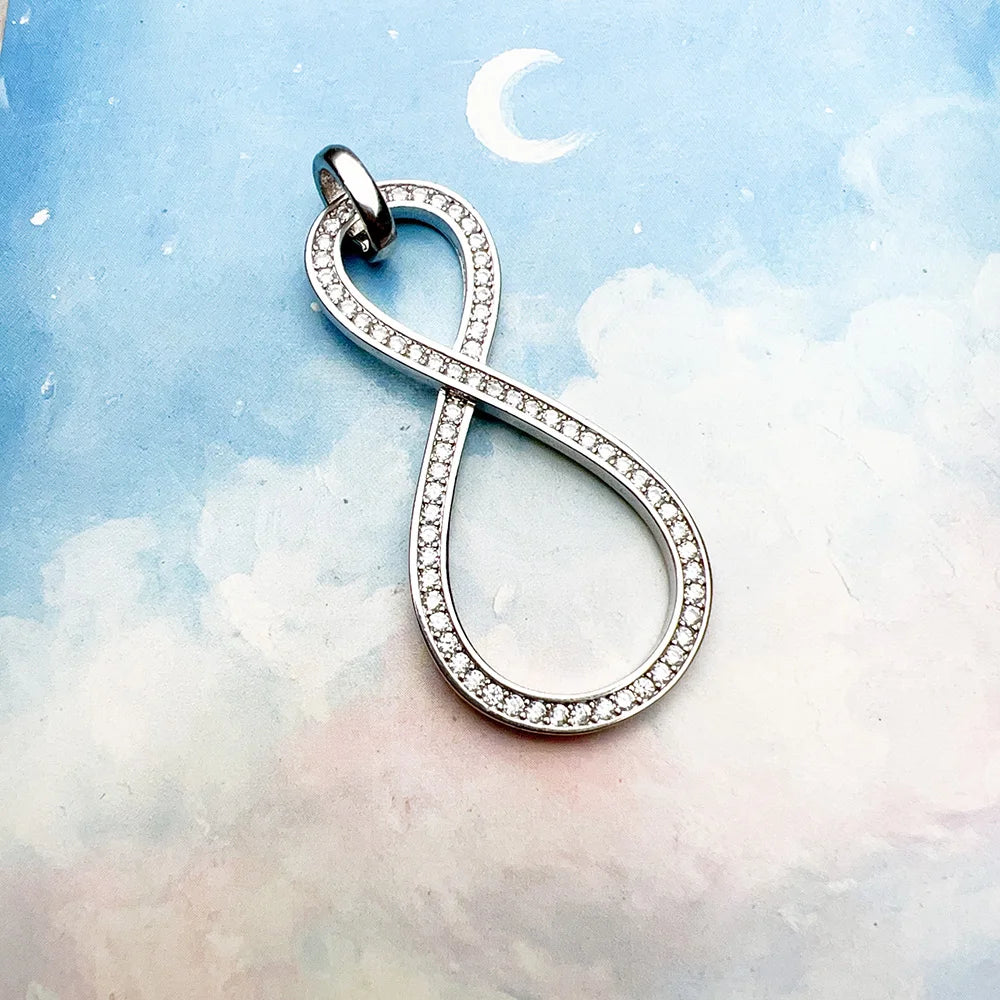 Anhänger Unendlichkeit aus silberfarbenem 925 Sterlingsilber mit Zirkoniasteinen und Öse