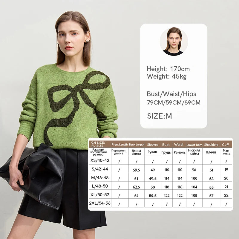 Grüner Damenpullover mit großem schwarzem Jacquard-Motiv, lockere Passform