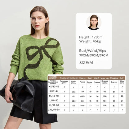 Grüner Damenpullover mit großem schwarzem Jacquard-Motiv, lockere Passform