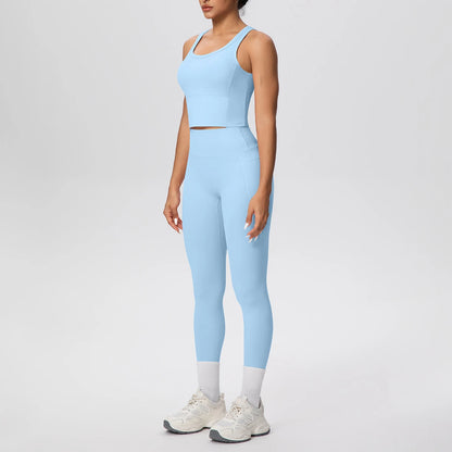 Damen-Yoga-Set in Hellblau: ärmelloses Crop-Top mit High-Waist Leggings und Kontrastknöcheln
