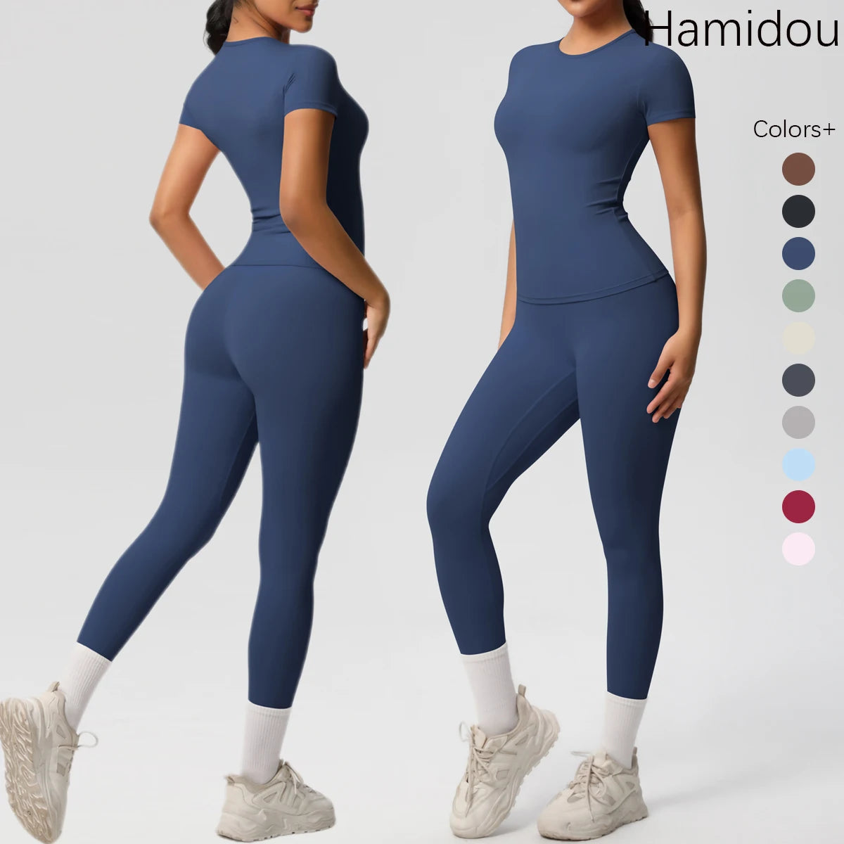 Dunkelblaues Sport-Set mit Crop-Top und enganliegender Leggings, 3/4-Länge, weißer Abschluss.